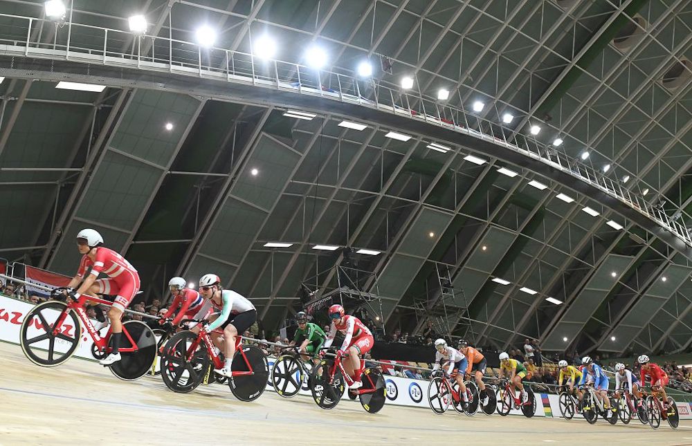 Athletes compete during the women' scratch competition of the UCI Track Cycling World Championships