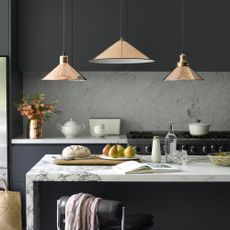 kitchen with granite worktop and grey panelled walls