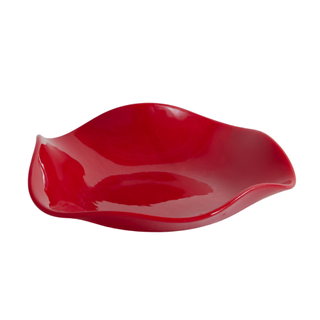 small decorative plate with wavy edges in bright red