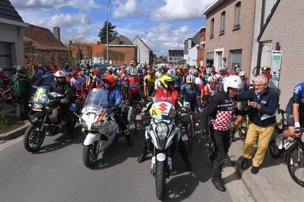 The men's race was halted with 74km to go