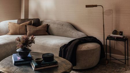 A sculptural sofa in a contemporary living room.