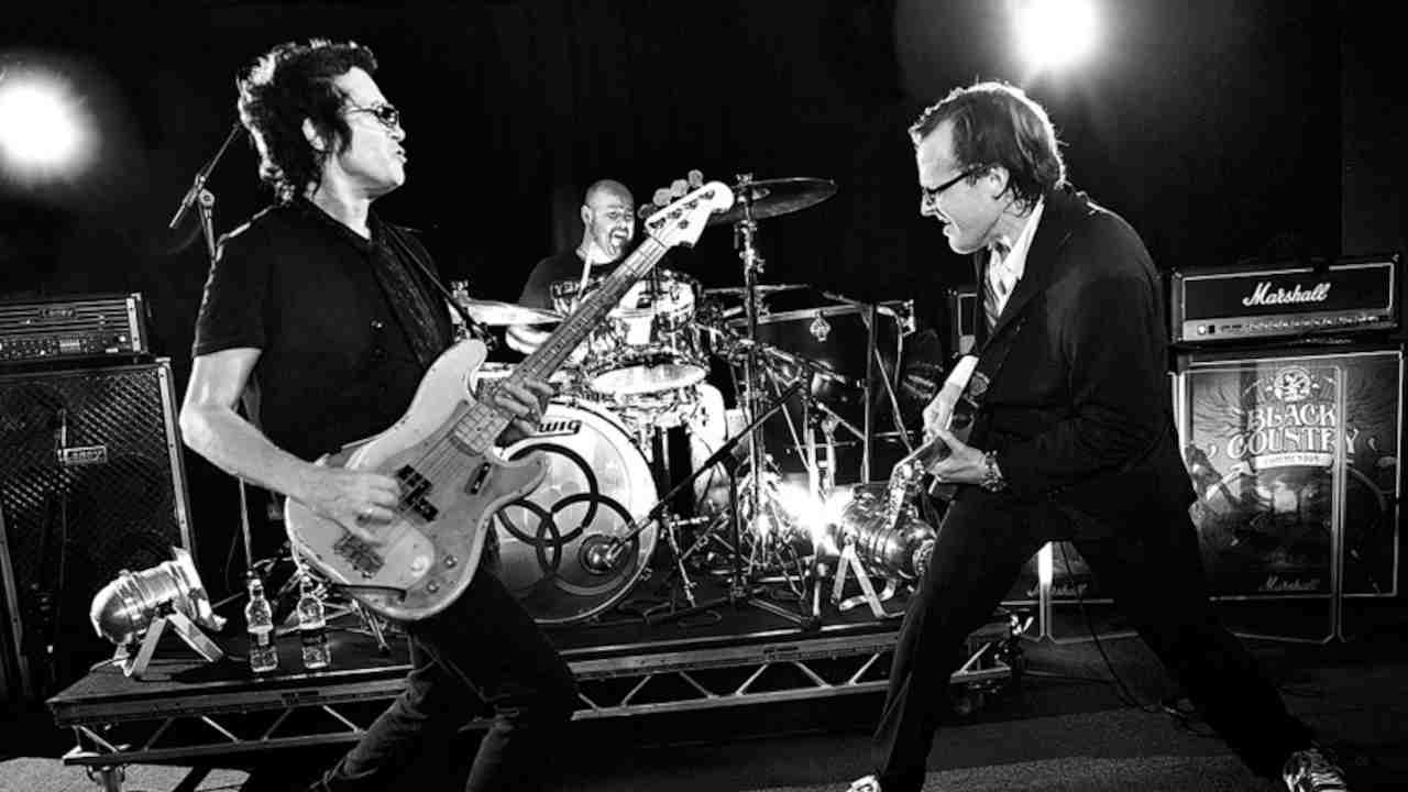 Black Country Communion’s Glenn Hughes and Joe Bonamassa performing onstage in 2012