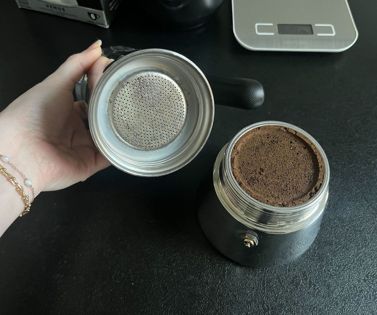 The bottom of the Bialetti Venus coffee maker after brewing