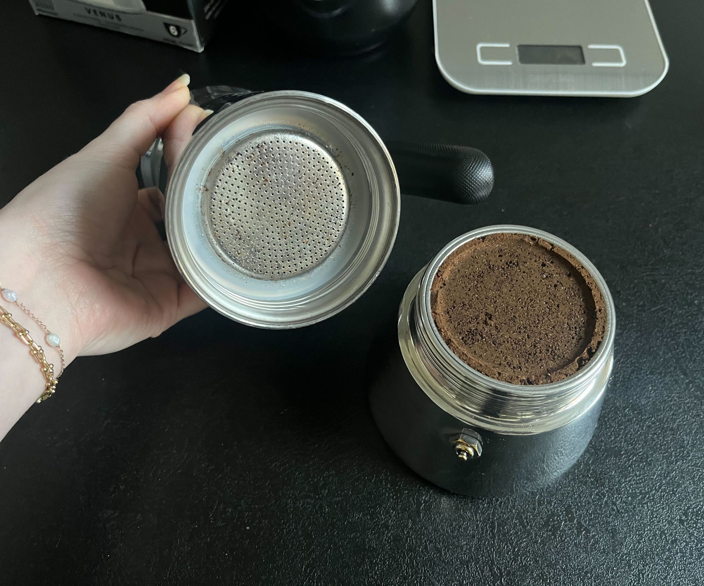 The bottom of the Bialetti Venus coffee maker after brewing