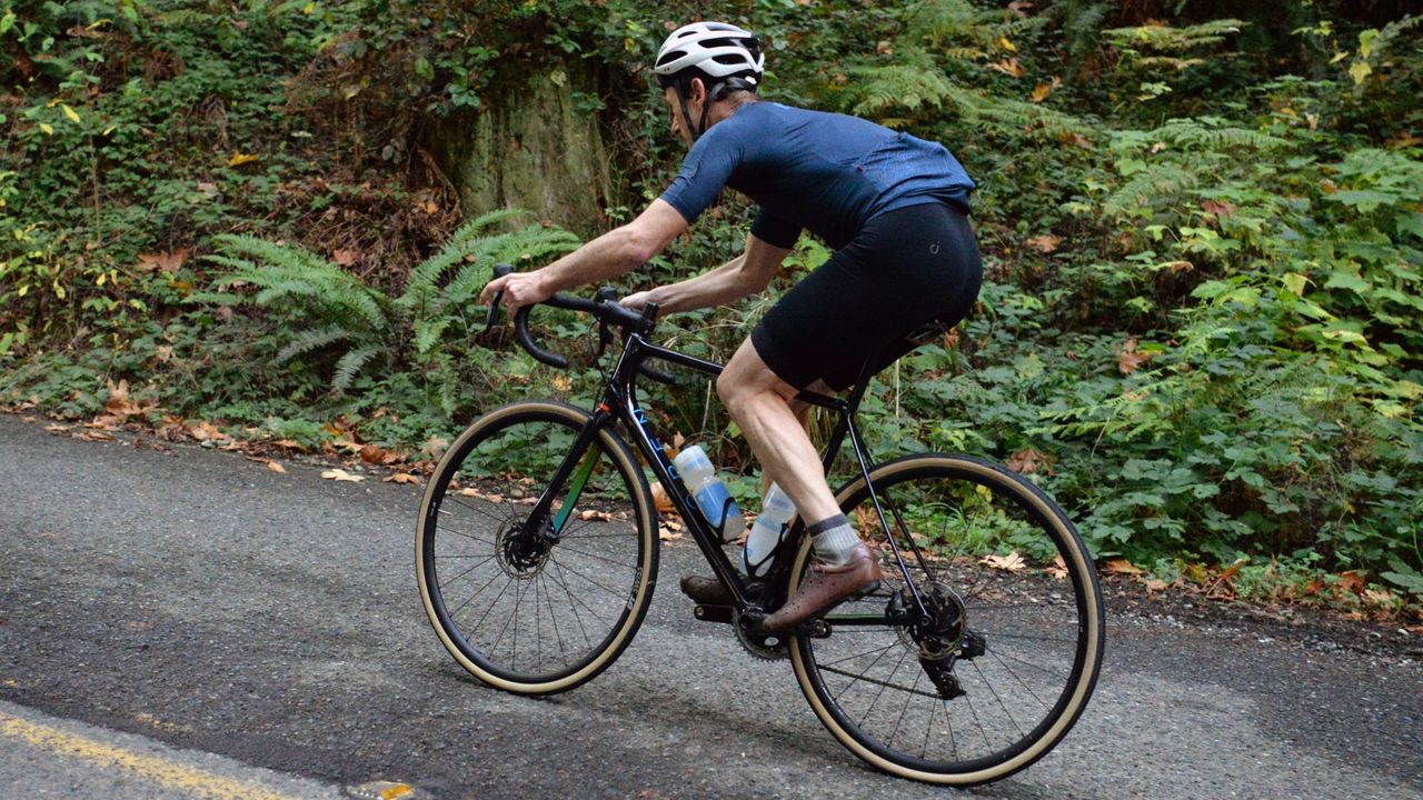 A road cyclist riding a bike fitted with Rene Herse Orondo Grand road tires