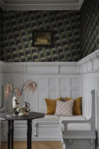Dining nook with wallpaper and gray panelling by Sandberg
