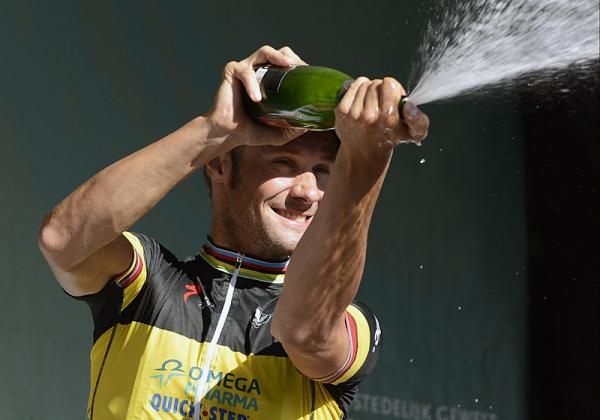 2012 Paris-Brussels champion Tom Boonen celebrates with a bit of champagne.