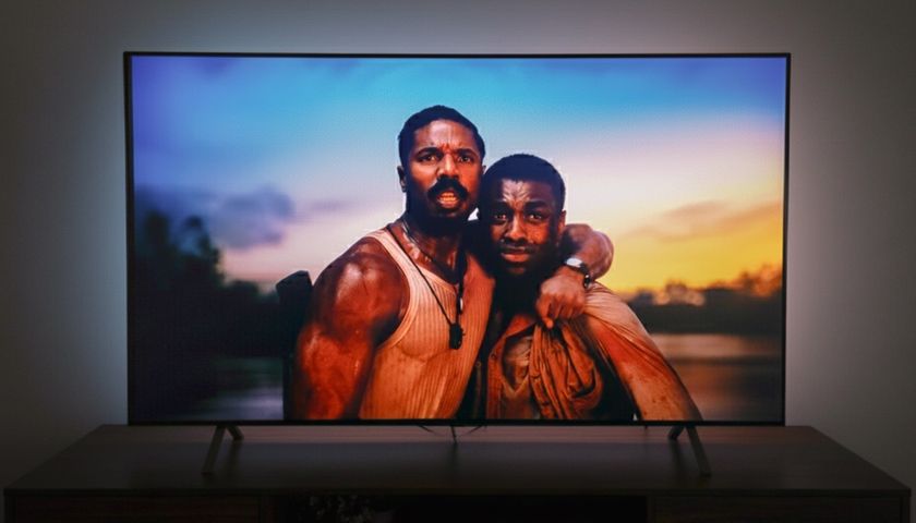 LG B5 OLED TV on a table in a darkened room