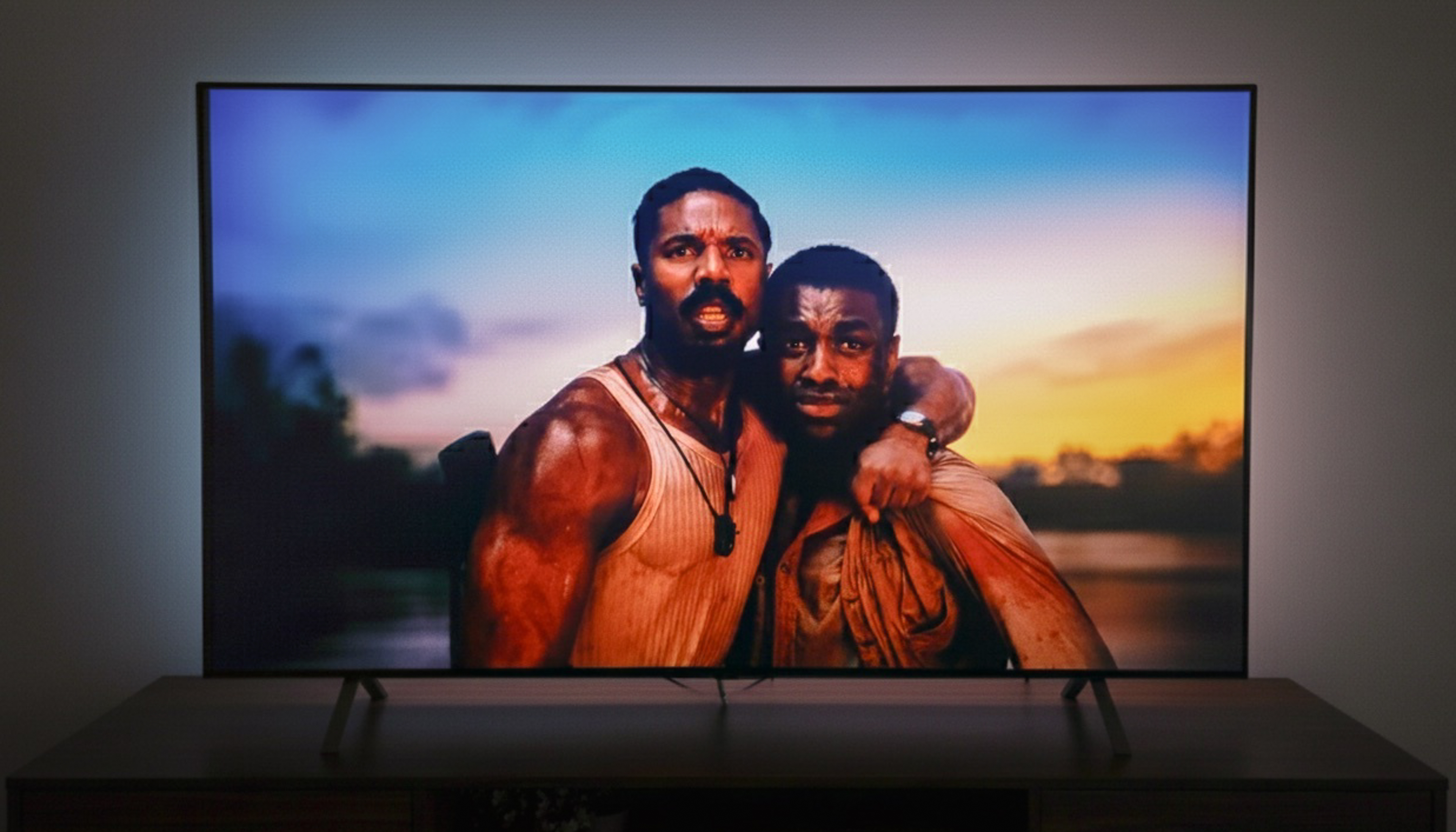 LG B5 OLED TV on a table in a darkened room