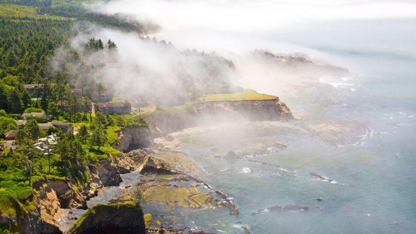 Morning fog over the Oregon coast, looking East from Cape Foulweather to Otter Rock.