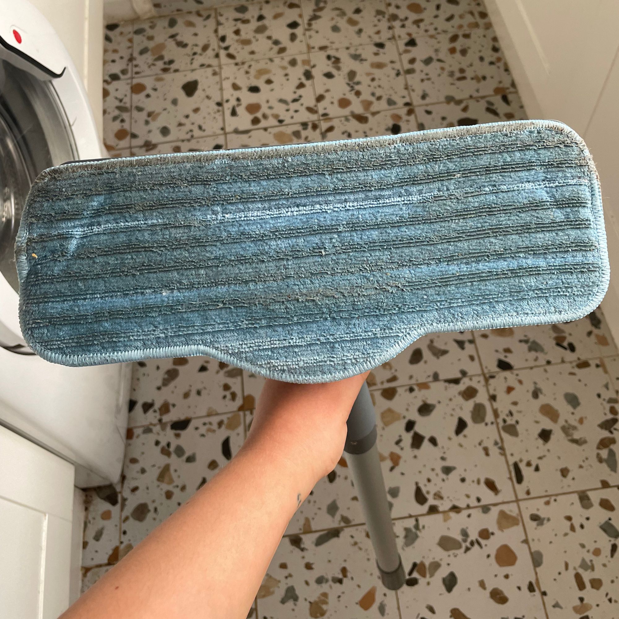 Dirty mop head of the Minky Opti-Clean Steam Cleaner
