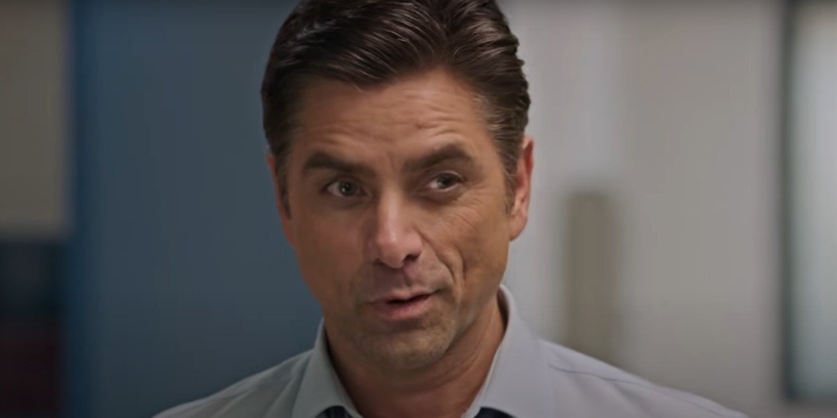 john stamos smirking in disney+&#039;s big shot