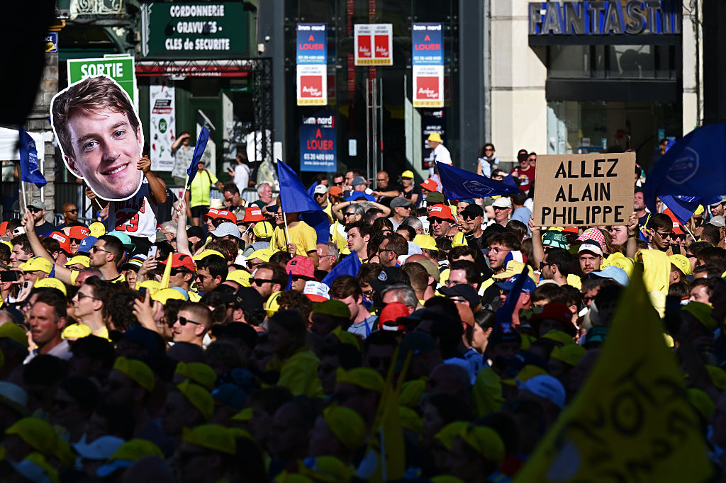 LILLE, FRANCE - JULY 03: Oliver Naesen of Belgium and Team Decathlon AG2R La Mondiale fans during the team presentation prior to the 112th Tour de France 2025 / #UCIWT / on July 03, 2025 in Lille, France. (Photo by Tim de Waele/Getty Images)