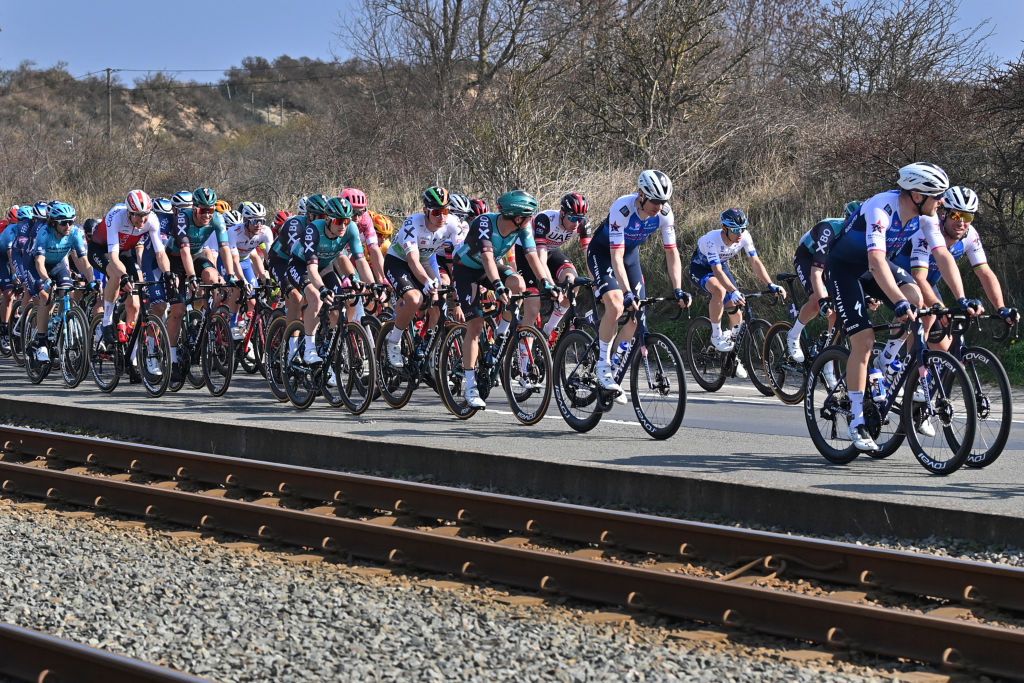 The pack rides during the Classic Brugge De Panne oneday cycling race 2079 km between Bruges and De Panne on March 23 2022 Belgium OUT Photo by DIRK WAEM Belga AFP Belgium OUT Photo by DIRK WAEMBelgaAFP via Getty Images