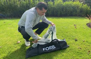 Photo of the forb golf net coming out of its bag