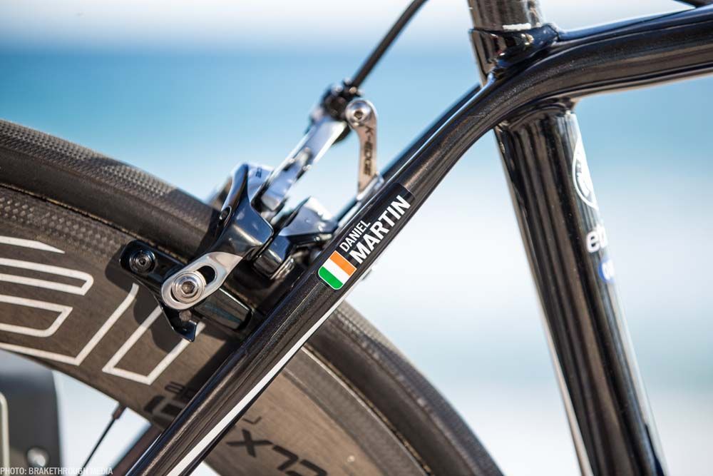The bike has a race number holder fitted with the rear brake