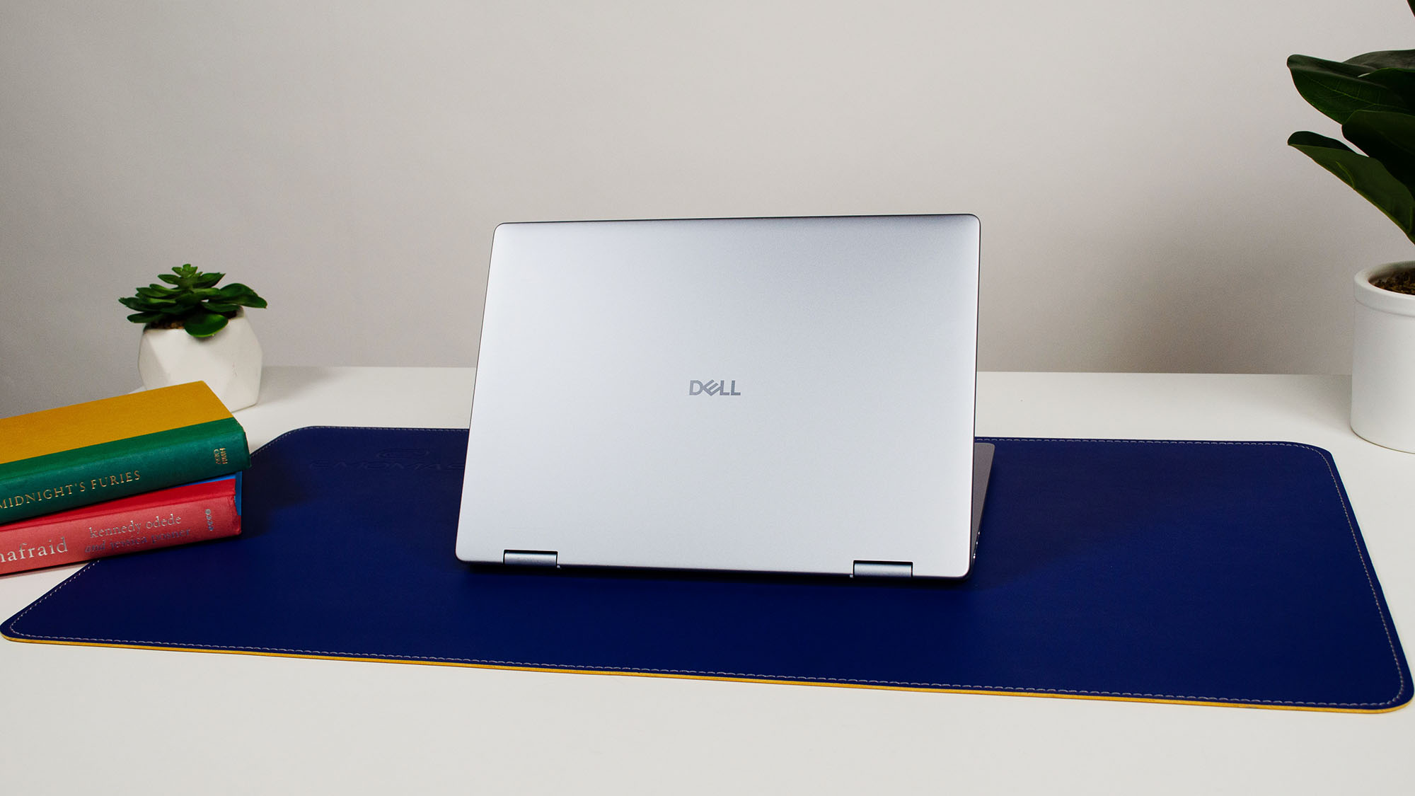 A Dell 14 Plus 2-in-1 with its lid facing outward
