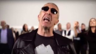 Screengrab of Dee Snider lip-syncing to Let It Be