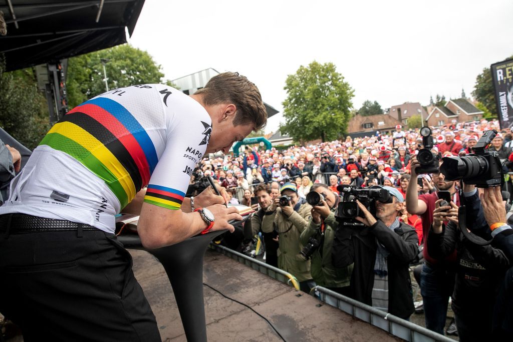 Belgian Remco Evenepoel new cycling world champion signs the city gold book during celebrations after his return from the UCI Road World Championships Cycling 2022 in Brussels on September 27 2022 The 22yearold from Schepdael Dilbeek became world champion after a great season with a win also at the Vuelta the first Belgian in 44 years to win a big tour Belgium OUT Photo by HATIM KAGHAT BELGA AFP Belgium OUT Photo by HATIM KAGHATBELGAAFP via Getty Images