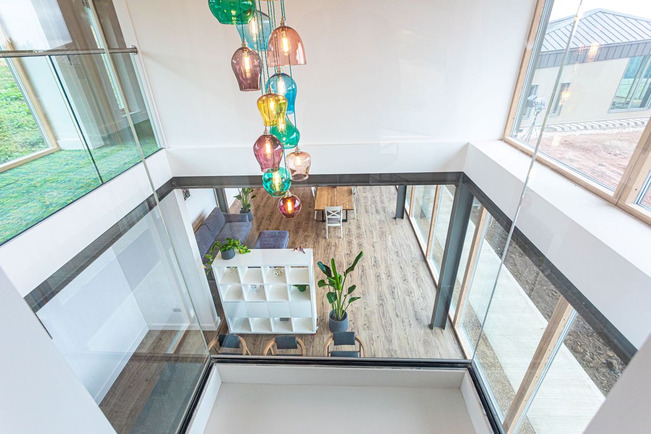The double-height roof space above the dining area