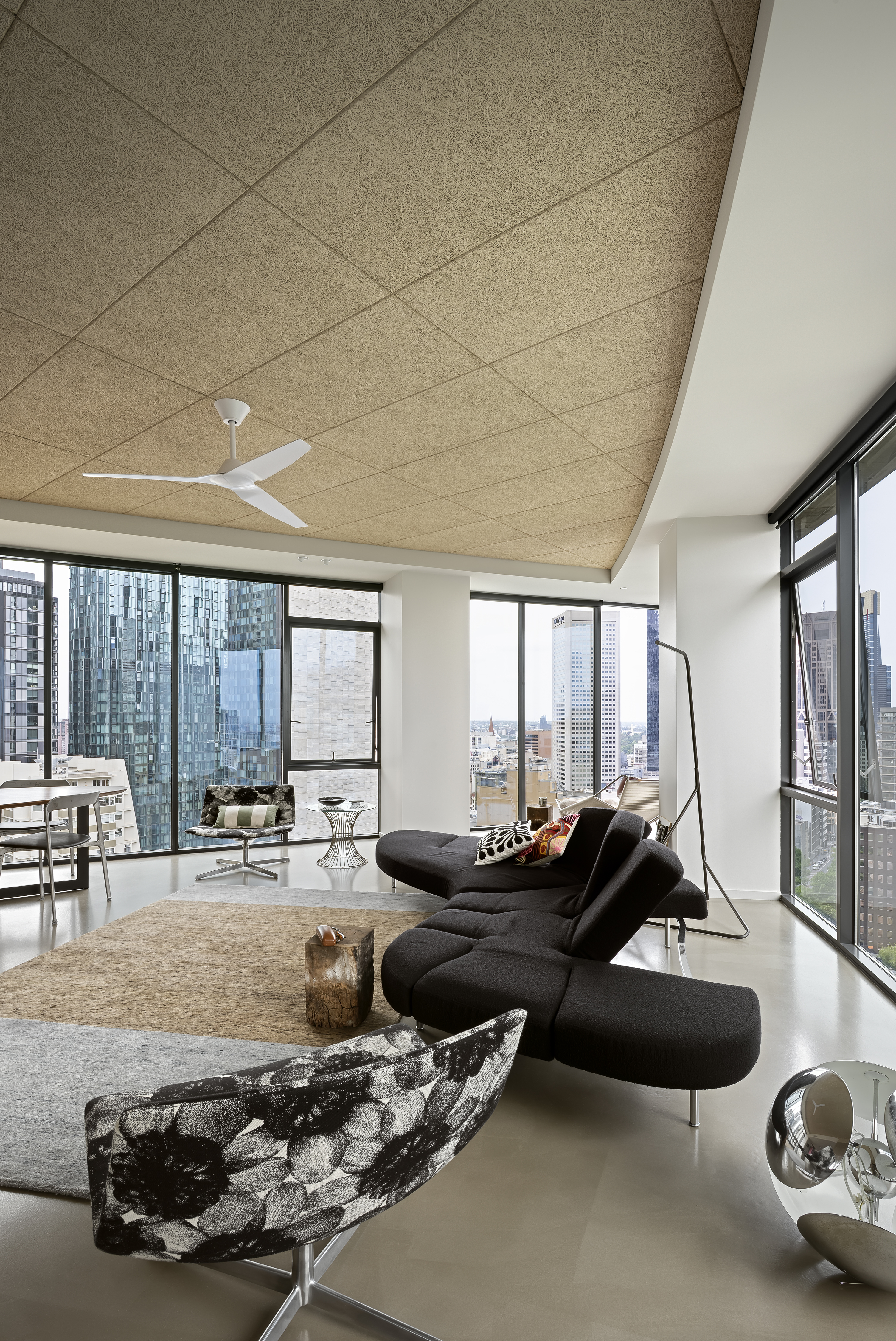 bright and open interiors with views through and reflections at The Republic Tower apartment by Multiplicity