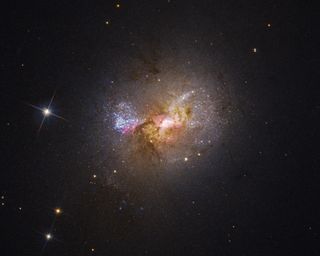 A Hubble Space Telescope image of the dwarf starburst galaxy Henize 2-10, shown in visible light.
