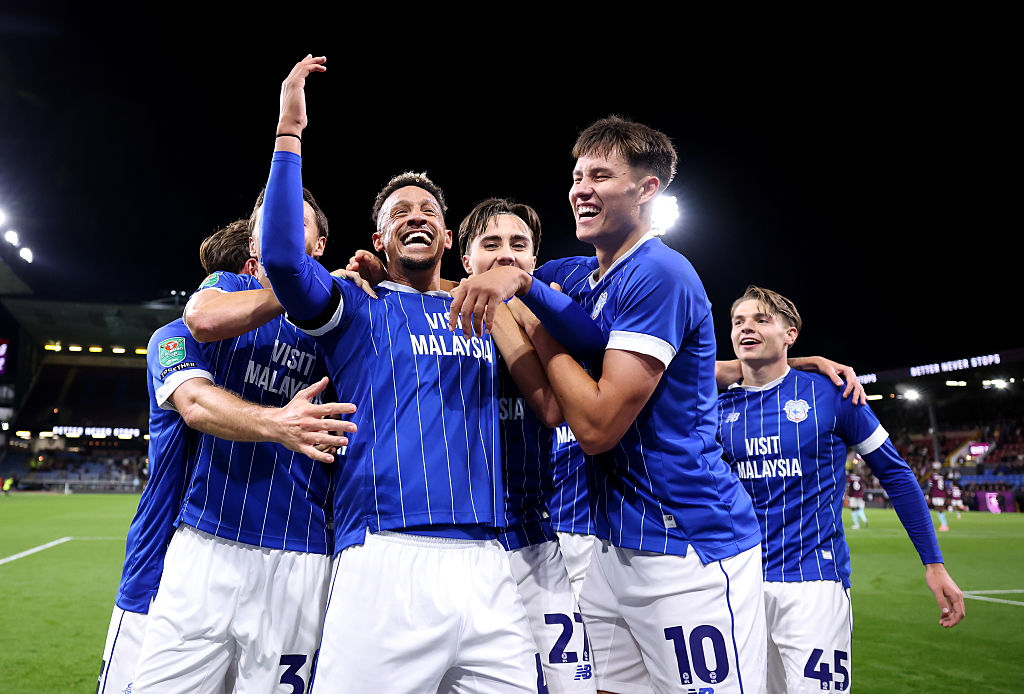 Callum Robinson of Cardiff City celebrates scoring his team&#039;s second goal with teammates during the Carabao Cup Third Round match between Burnley and Cardiff City at Turf Moor on September 23, 2025 in Burnley, England.
