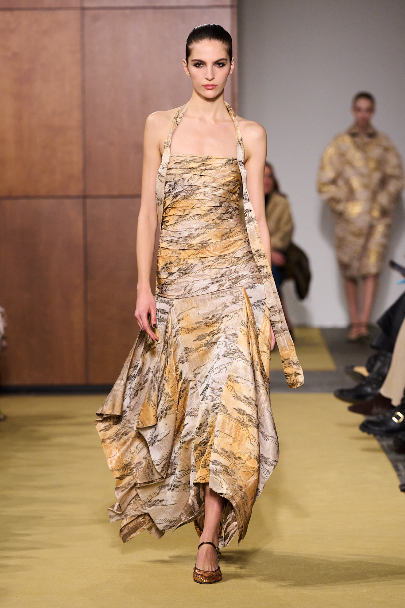 Photo of model wearing printed dress trend from New York Fashion Week Fall Winter 2026 runway show.