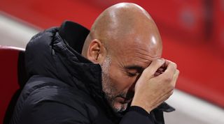 BRENTFORD, ENGLAND - FEBRUARY 05: Pep Guardiola, Manager of Manchester City, reacts prior to the Premier League match between Brentford FC and Manchester City at Brentford Community Stadium on February 05, 2024 in Brentford, England. (Photo by Ryan Pierse/Getty Images)