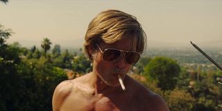 Shirtless Brad Pitt smoking cigarette in Once Upon a Time in Hollywood
