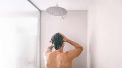Man using shampoo in the shower