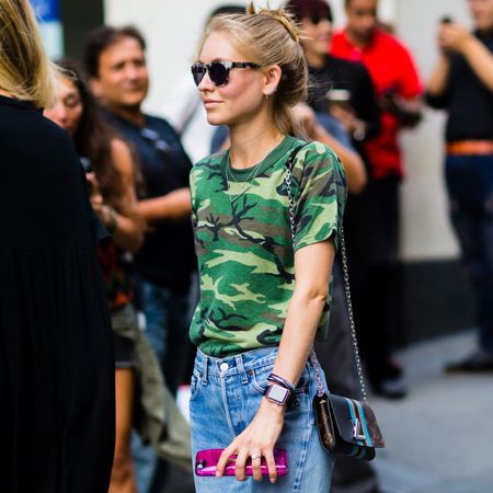 Jessica Minkoff wearing sunglasses and camo print t-shirt
