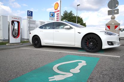 A Tesla car recharges in Germany.