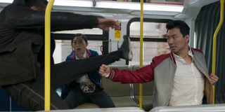 Shang-Chi fighting for his life on the bus in Shang-Chi and the Legend of the Ten Rings