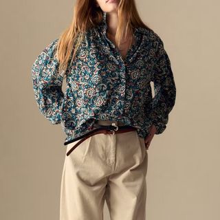 Image of a woman wearing a floral blouse