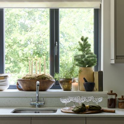 Kitchen sink with a chopping boards styled with coupes