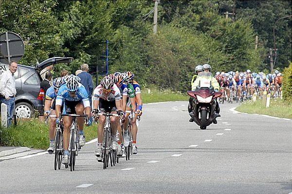 The breakaway is in sight of the peloton at kilometre 58