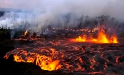 The grounds of the Hawaii's volcanoes national park are covered in molten lava after the Kilauea volcano erupts nearby.