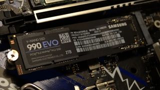 A Samsung 990 EVO SSD slotted into a motherboard