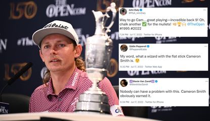 Smith sits in front of the Claret Jug