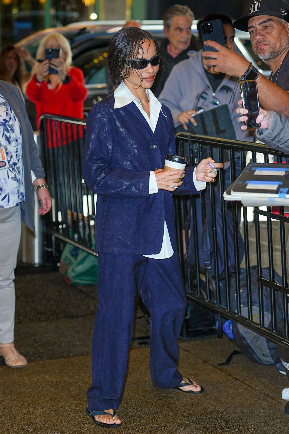 Zoe Kravitz Trouser suit and flip flops