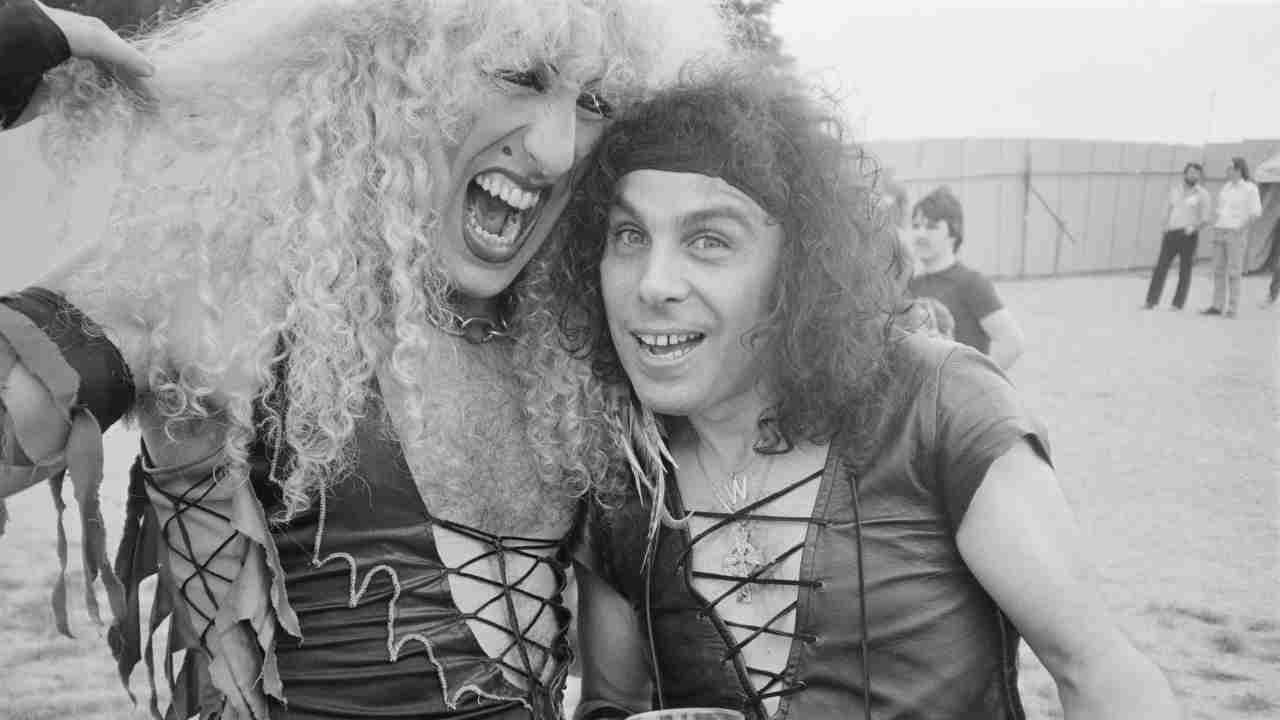 Ronnie James Dio posing for a photograph with Twisted Sister&amp;rsquo;s Dee Snider backstage at a festival in the 1980s
