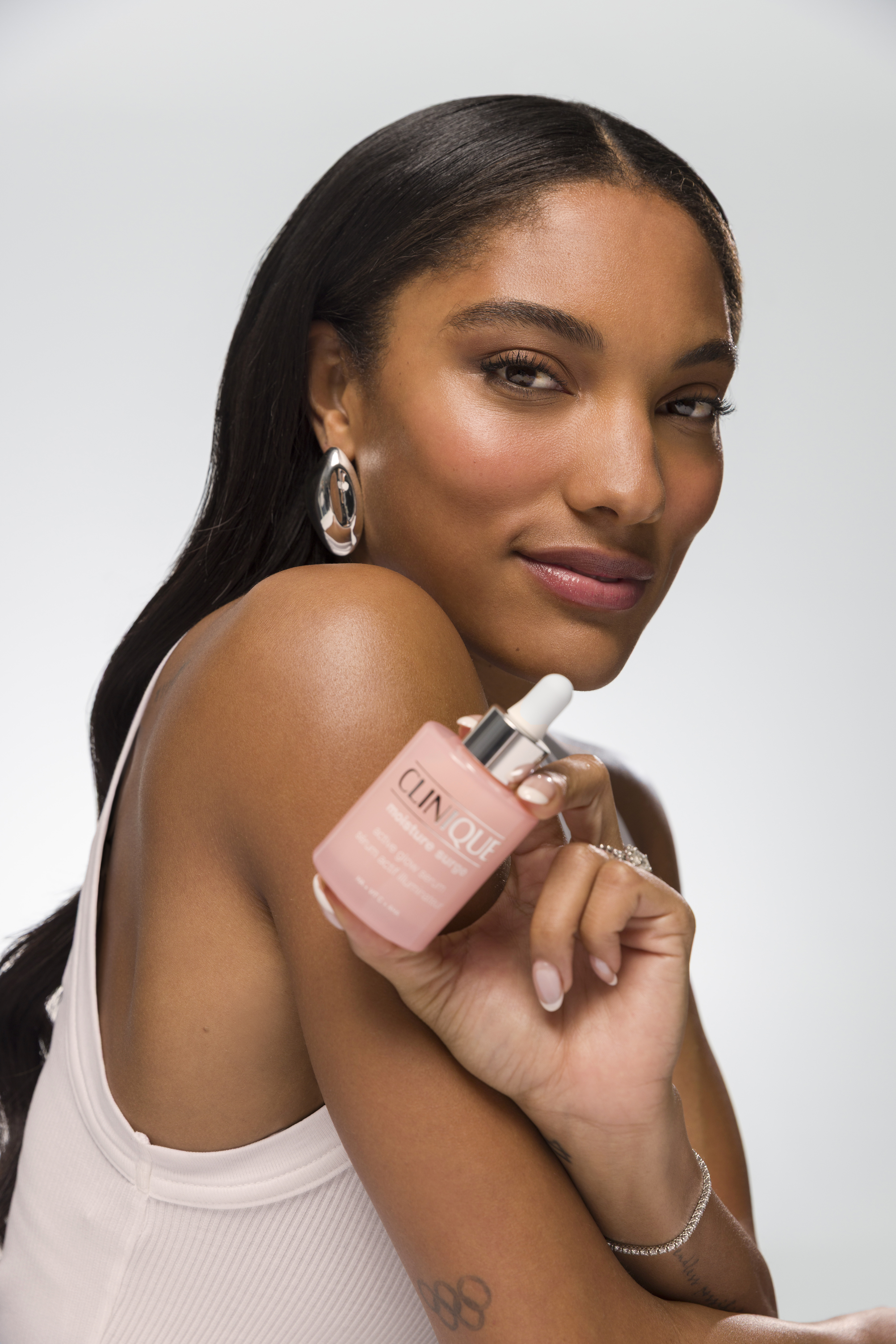 Image of Tara Davis-Woodhall in a 2026 Clinique campaign.