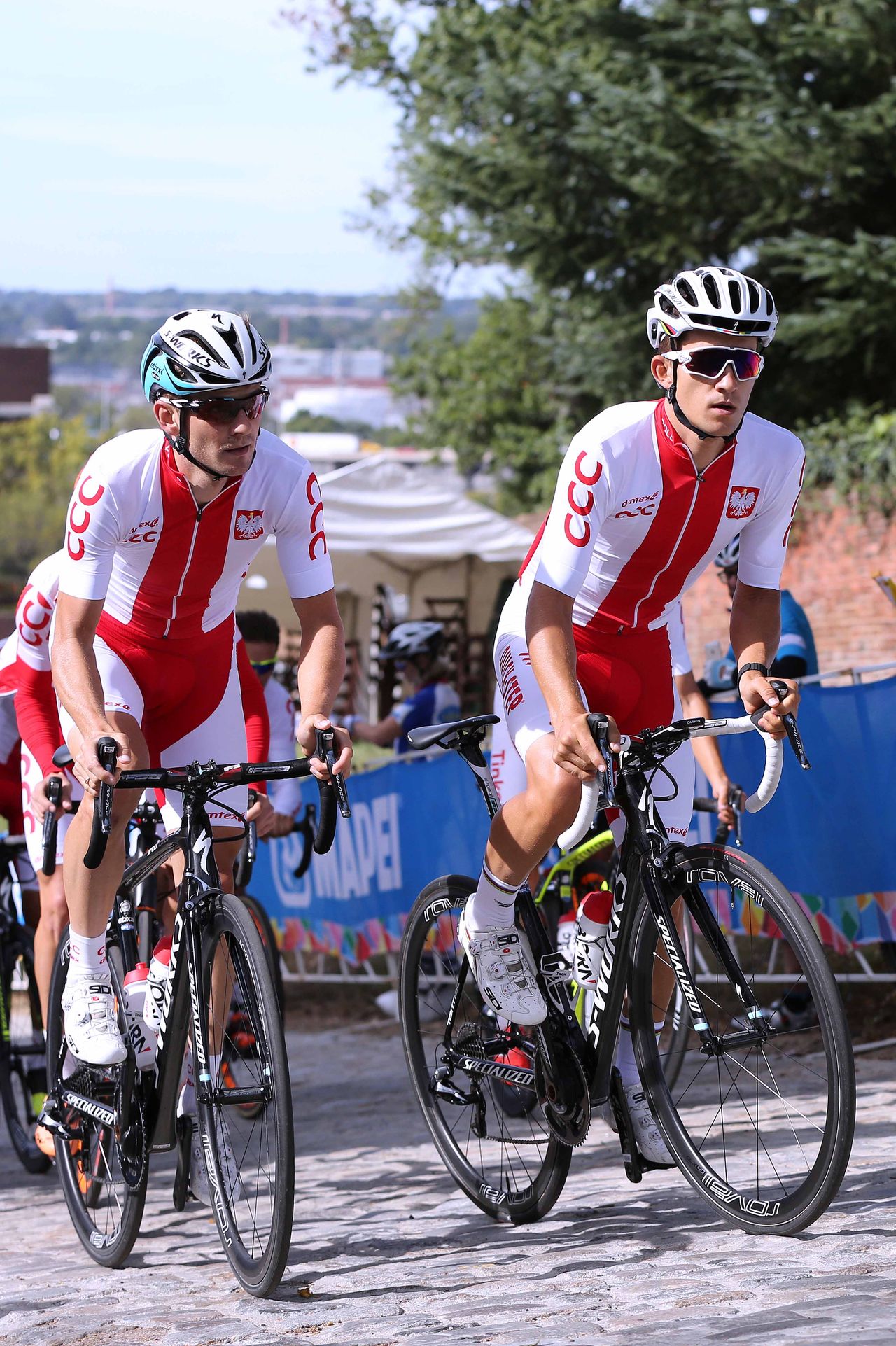 The two Michał's, Golas and Kwiatkowski, climbing alongside each other