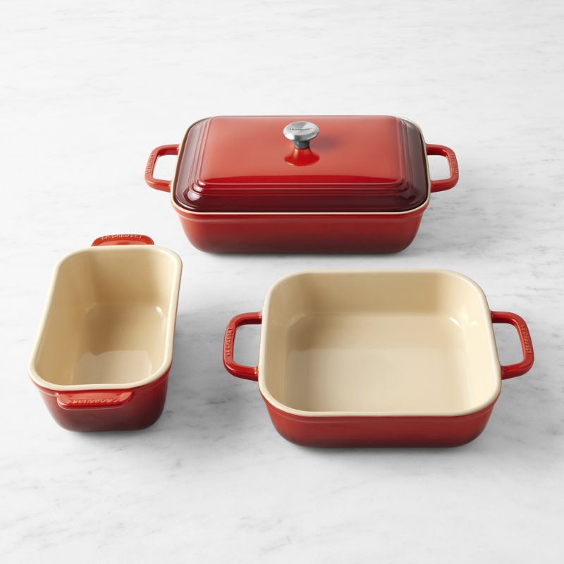 Red three-piece Le Creuset baking dish set