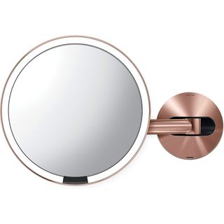 Rose gold mounted makeup mirror