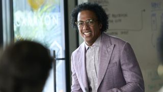 Nick Cannon smiling in Accused season 2