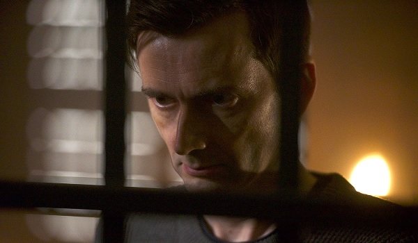 Bad Samaritan David Tennant looking evil through the bars