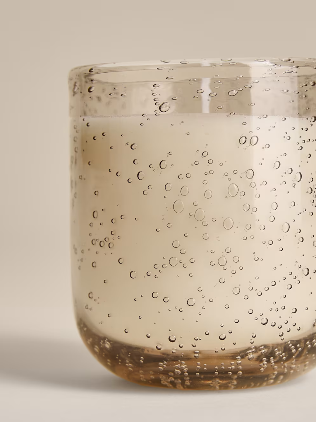 A bubbled glass candle from M&amp;amp;S