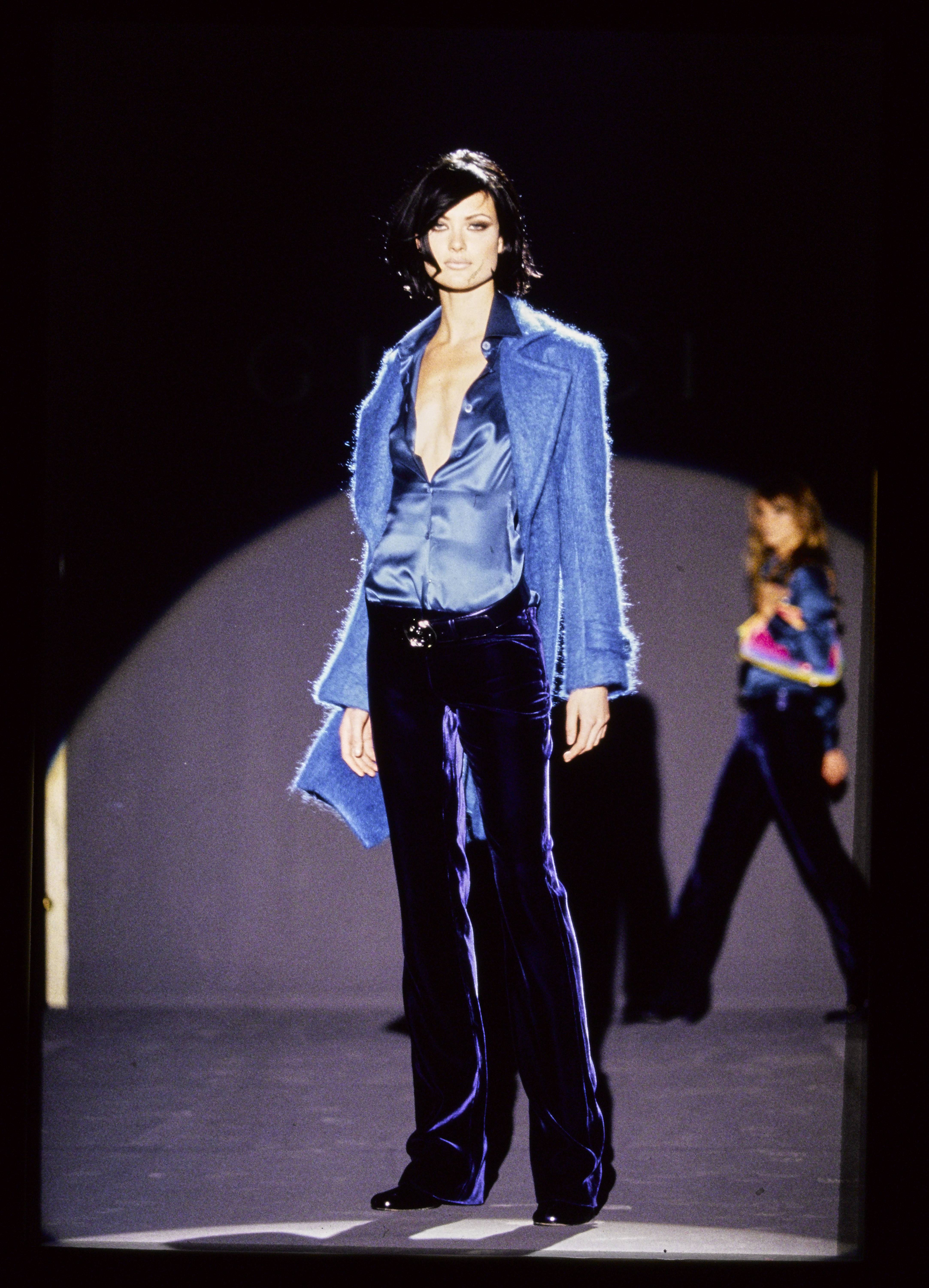Shalom Harlow wearing a silk top with velvet trousers on the Gucci fall 1995 runway